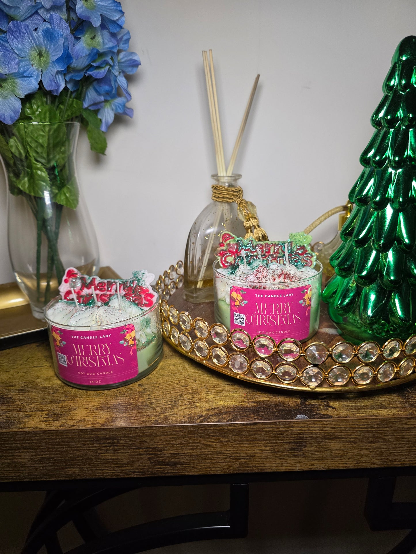 Decorative Candle with holiday design on a wooden surface