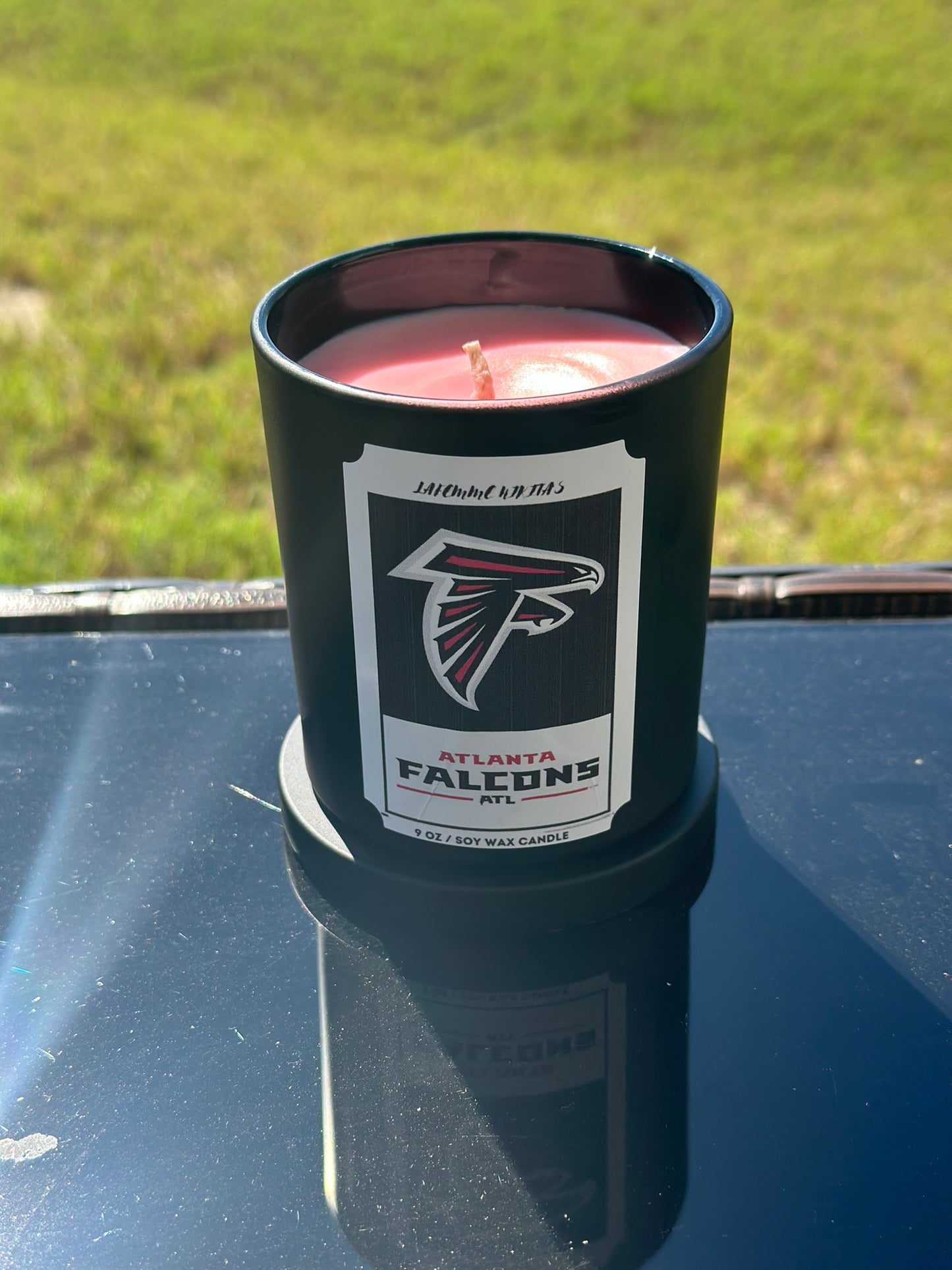 Lafemme Nikita's "Who You With" NFL Team Candles