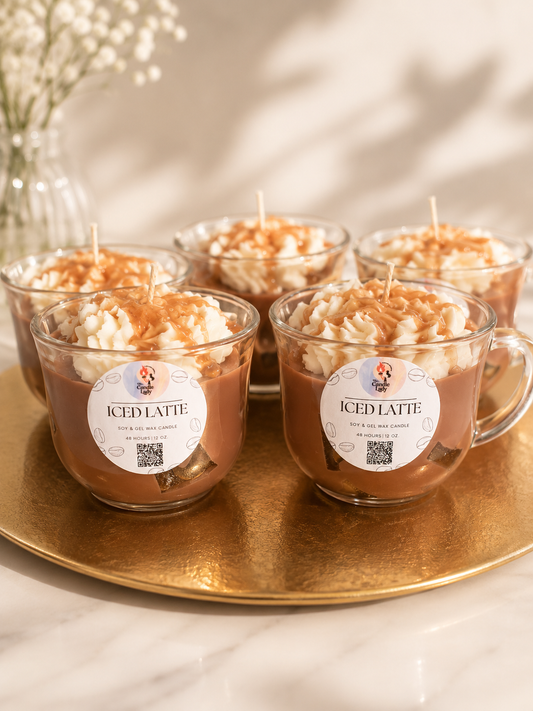 Iced latte coffee inspired candles made with soy and gel wax topped with caramel drippings, sitting on a gold tray 