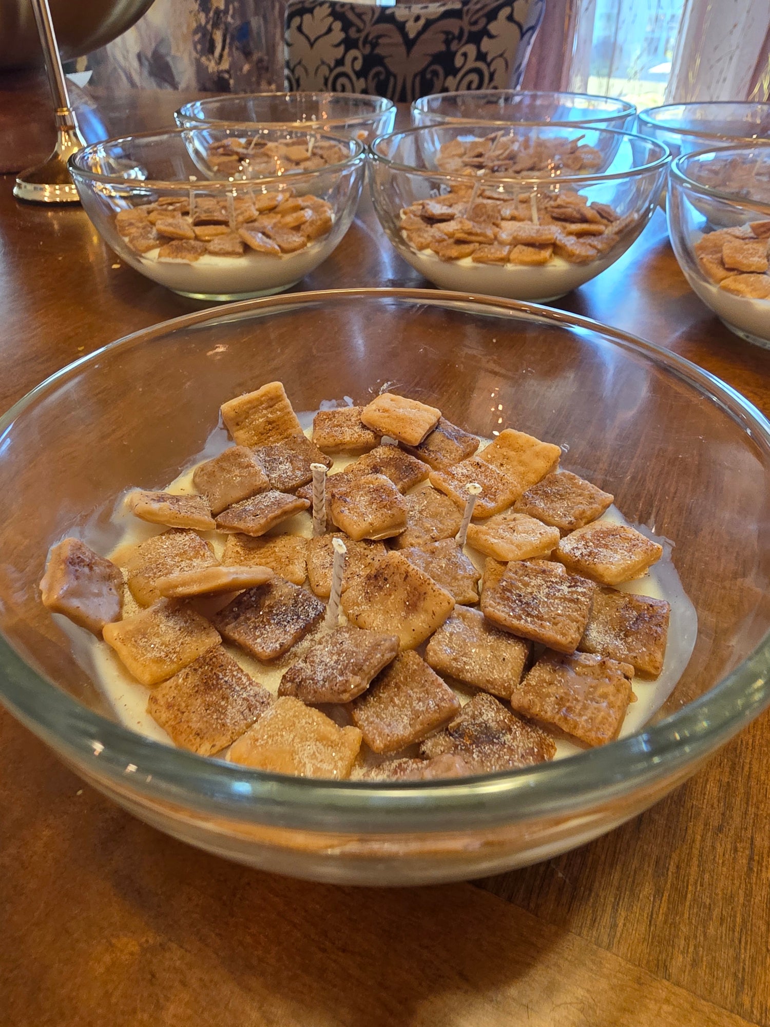 cinnamon toast crunch candle in a glass bowl