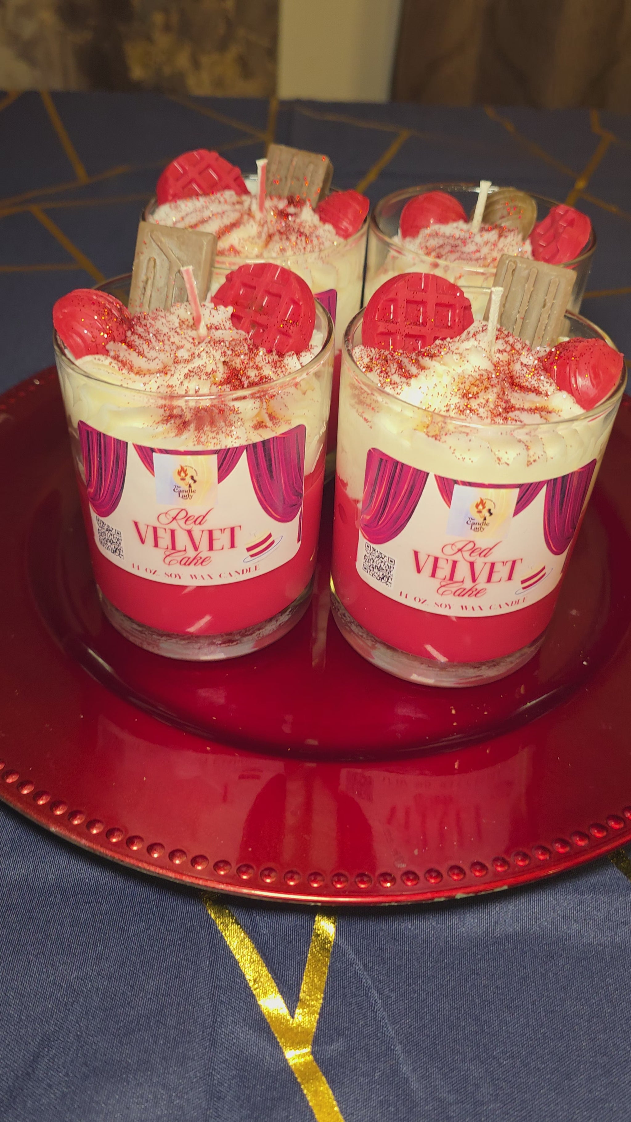 two red velvet cake candles on a red platter video